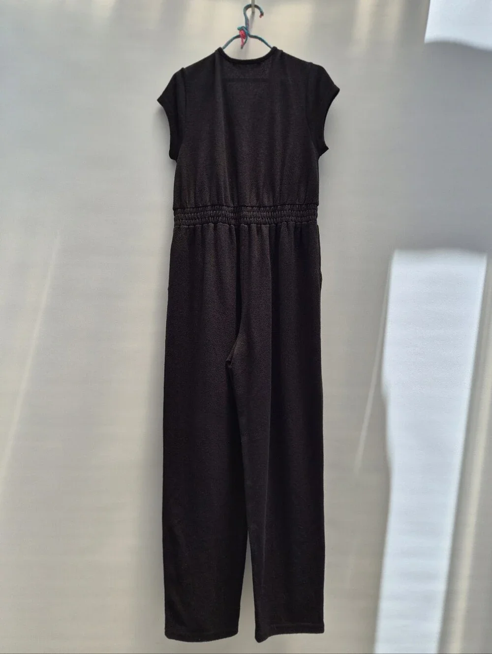Free People Beach Rita Jumpsuit M Black Terry Knit Deep V Minimalist Resortwear